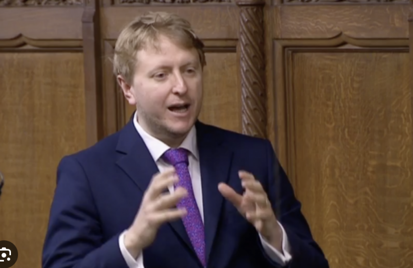 Mark Logan MP speaking in the chamber